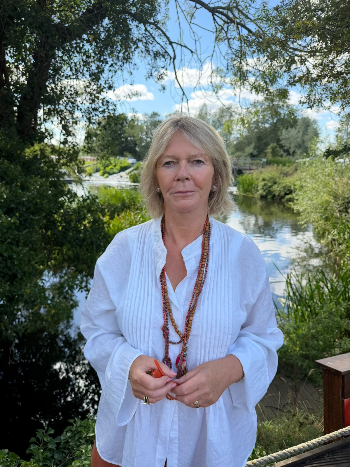 Fiona Atkinson outdoors beside the water